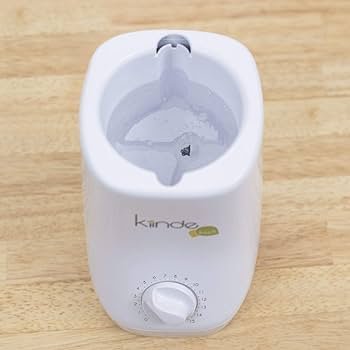 pratique chauffe lait maternel babymoov